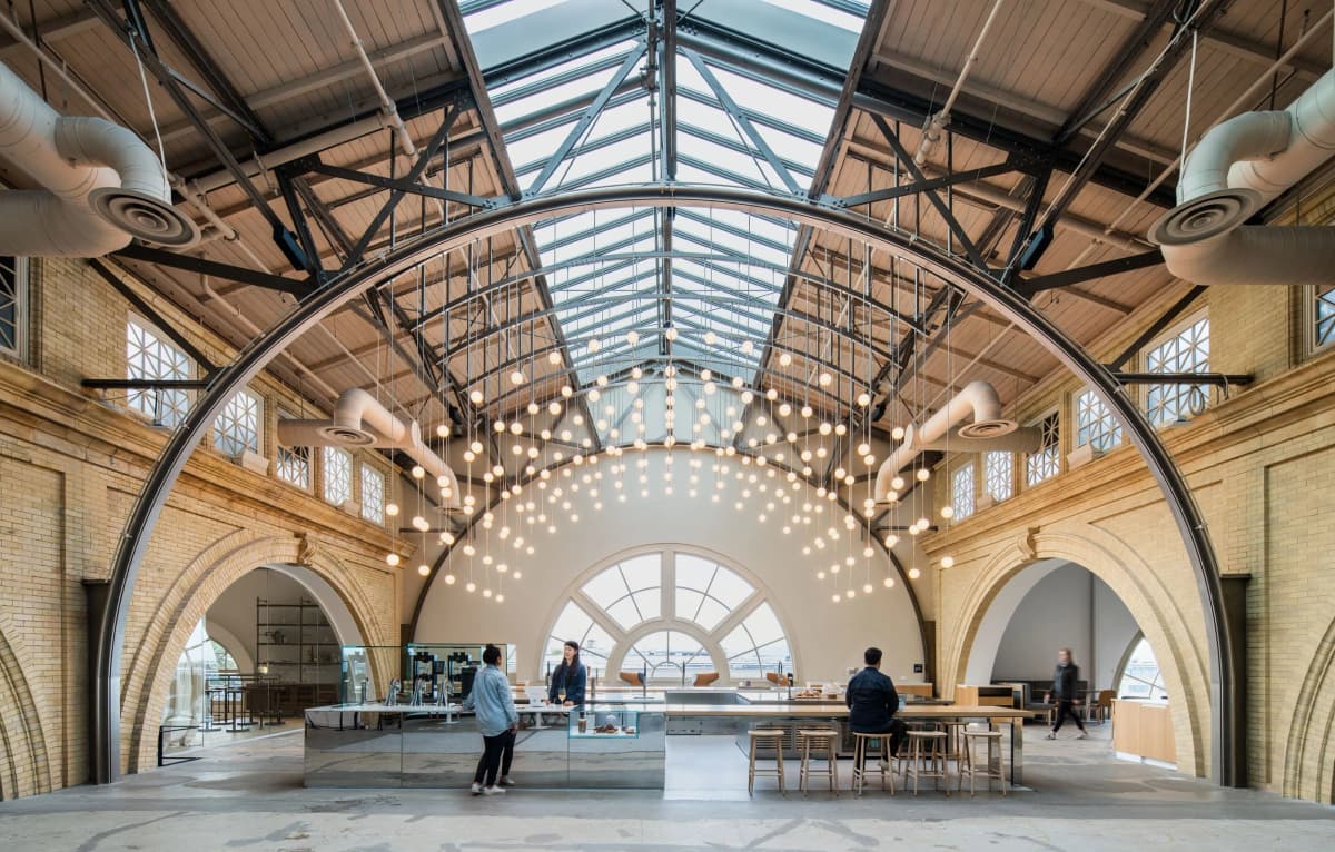 Shack15 interior - modern event space with floor-to-ceiling windows overlooking San Francisco Bay, venue for PyAI Conference